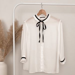 White Ivory Zara Blouse with adjustable collar tie bow.
